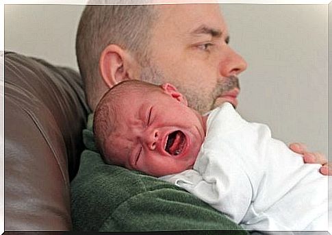 Dad with a crying baby