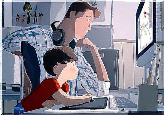 Father with son at the computer