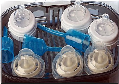 Thoroughly clean baby bottles with a sterilizer