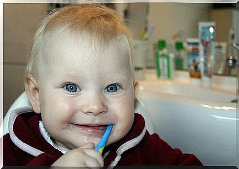 When do you start brushing your baby's teeth?